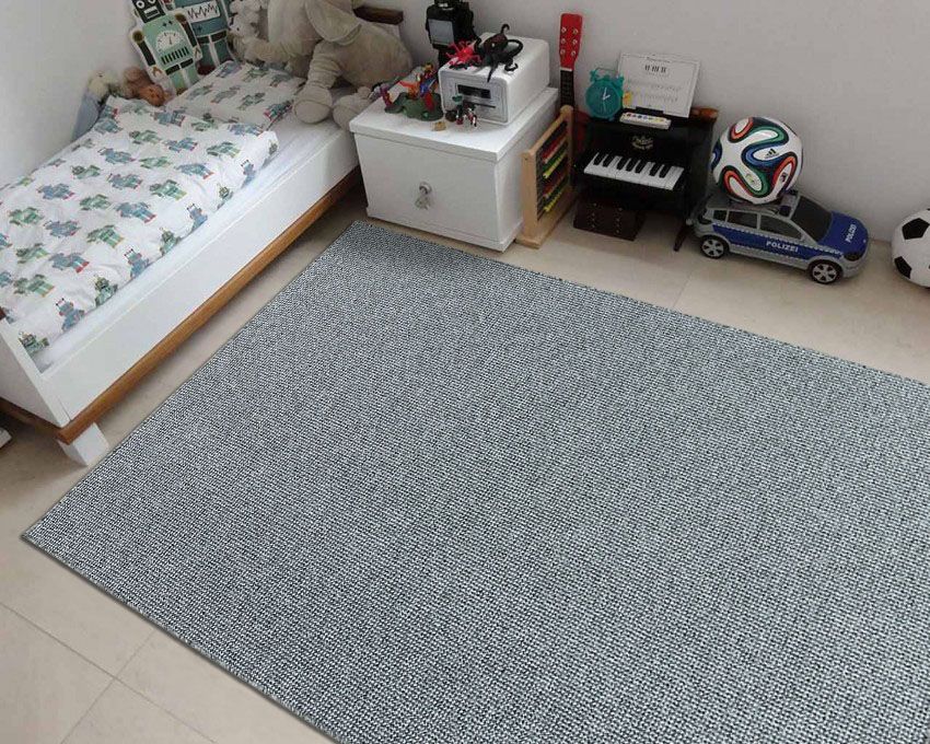 Wykładzina dywanowa szara świetnie dopasuje się do różnych dodatków